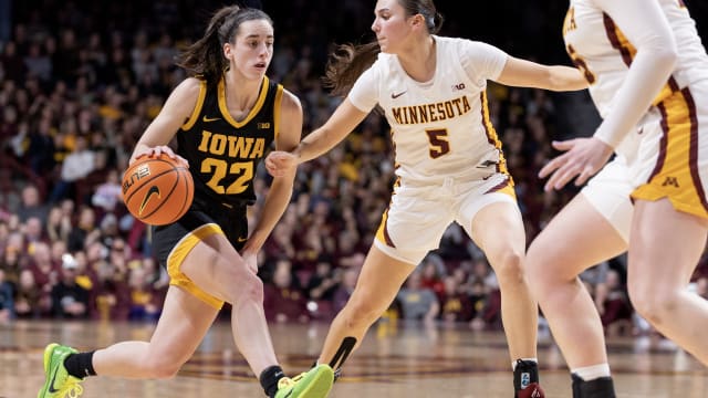 Caitlin Clark (22) of the University of Iowa Hawkeyes is defended by Maggie Czinano (5) of the University of Minnesota Golden Gophers in the third quarter Wednesday, February 28, 2024, at Williams Arena in Minneapolis, Minn.