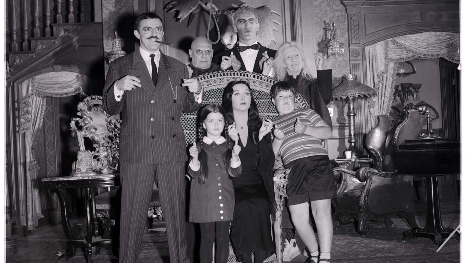 The cast of The Addams Family in an episode titled "Uncle Fester's Toupee" which aired April 30, 1965.