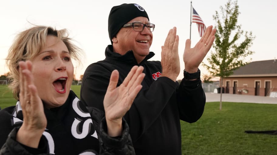 Gwen and Tim Walz at their daughter's soccer game in 2018.