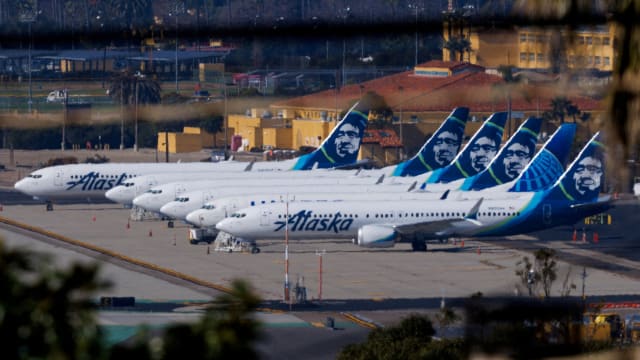 An Alaska Airlines flight turned back to Portland International Airport after passengers reported smelling fumes in the cabin. 