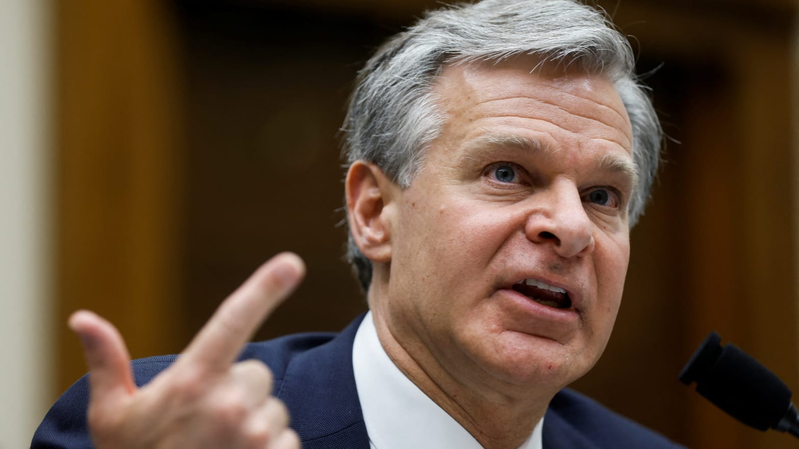 FBI Director Christopher Wray fielded questions from Republicans about Jan. 6 and the Covid-19 lab-leak theory.