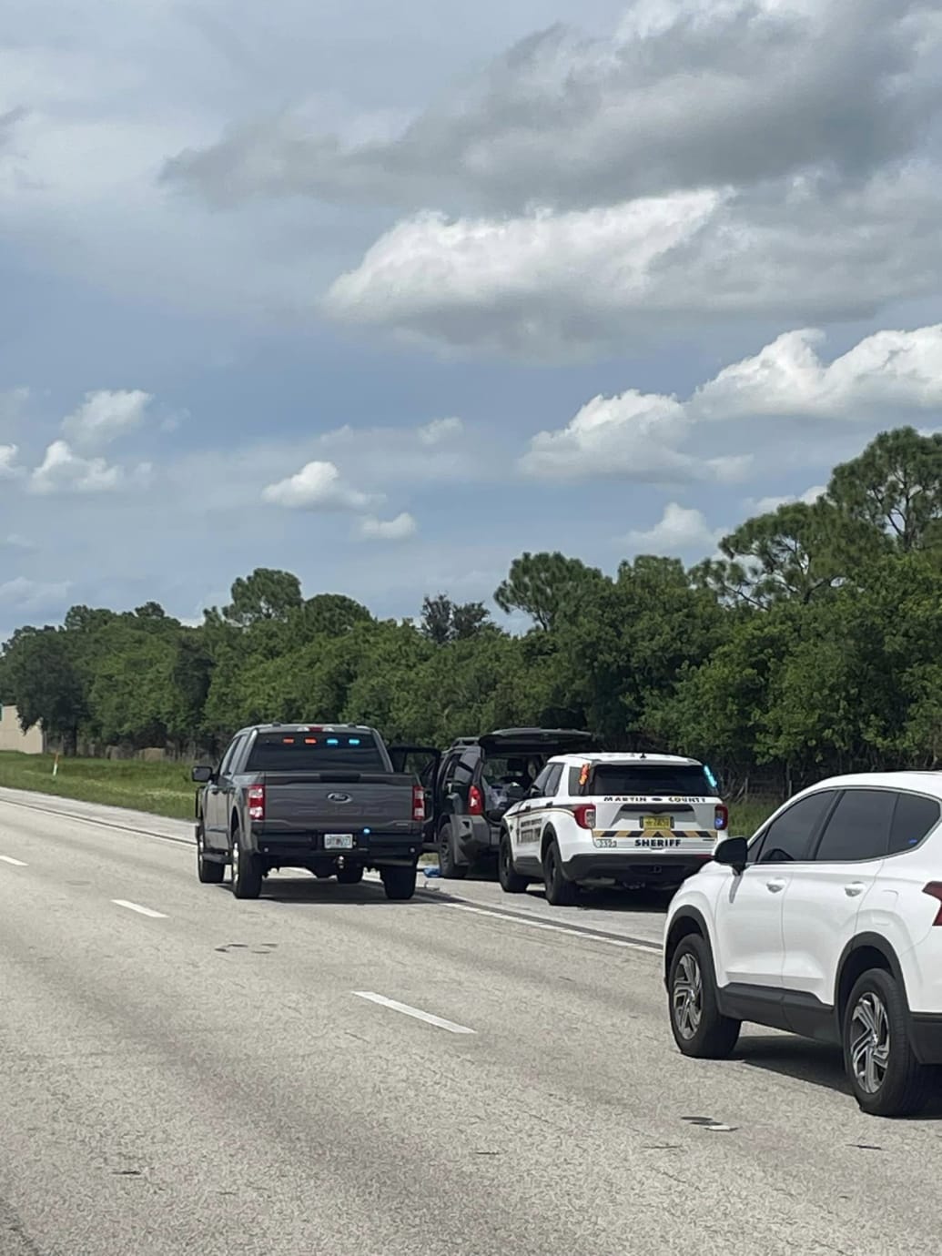 A car stopped on the side of the road in Florida