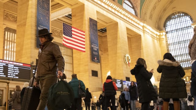 People walk through Grand Central Terminal in New York City.