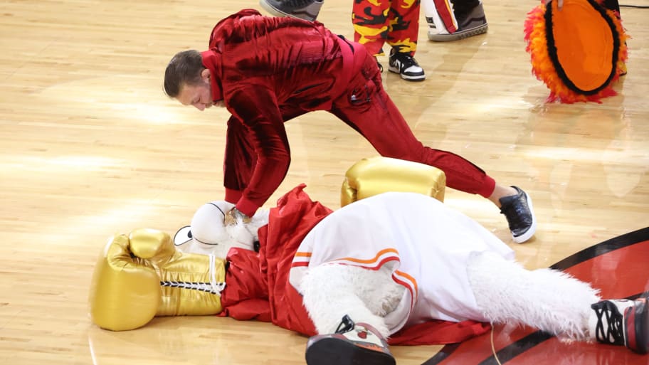 Conor McGregor and Mascot Burnie of the Miami Heat perform during halftime against the Denver Nuggets during Game Four of the 2023 NBA Finals on June 9, 2023.