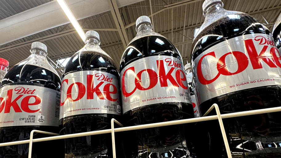 Bottles of Diet Coke which use Aspartame, an artificial sweetener set to be listed as a possible cancer risk by WHO. 