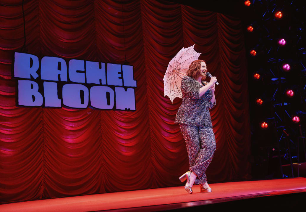 Rachel Bloom performing in her show “Death, Let Me Do My Show”