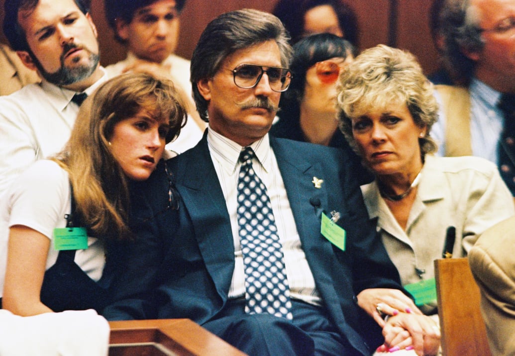 Fred Goldman (C), father of Ronald Goldman, his daughter Kim and wife Patty listen to testimony at a hearing for O.J. Simpson’s murder trial.