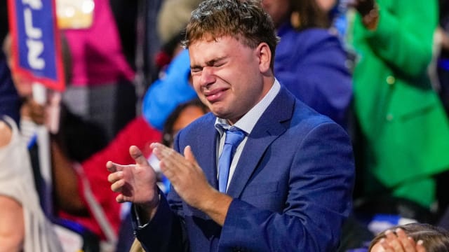 Gus Walz cries as Democratic vice presidential nominee Minnesota Gov. Tim Walz speaks during the Democratic National Convention Wednesday, Aug. 21, 2024, in Chicago.