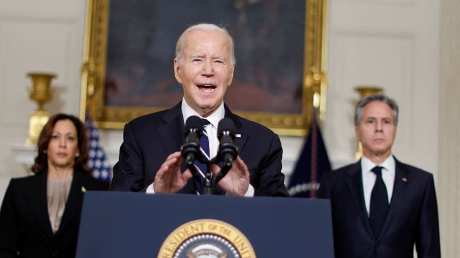 Joe Biden flanked by Vice President Kamala Harris and U.S. Secretary of State Antony Blinken
