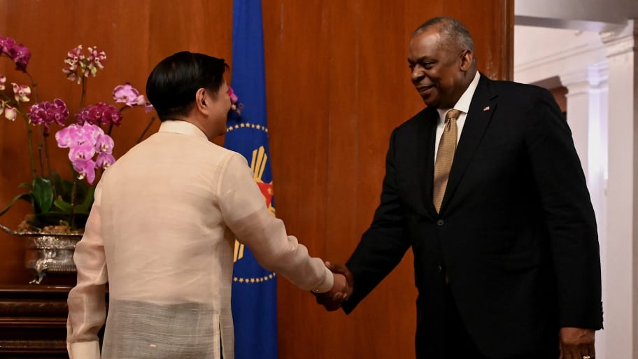 U.S. Defense Secretary Lloyd Austin III shakes hands with Philippines President Ferdinand “Bongbong” Marcos Jr. at the Malacanang presidential palace in Manila, Philippines.