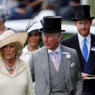 Charles, then-Prince of Wales, Camilla, Duchess of Cornwall, Britain's Prince Harry and Meghan, the Duchess of Sussex arrive at Ascot racecourse, June 19, 2018.