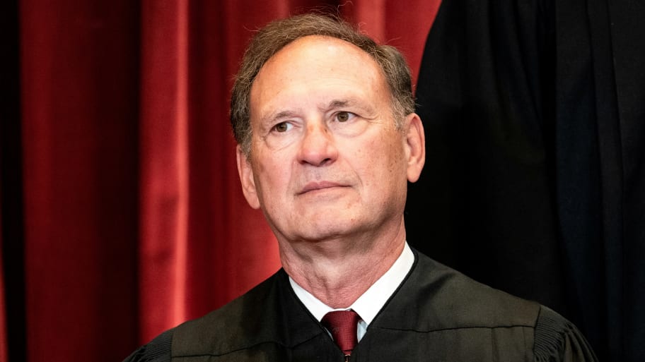 Associate Justice Samuel Alito poses during a group photo of the Justices at the Supreme Court in Washington, U.S., April 23, 2021. 