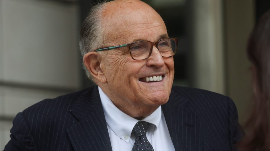 Rudy Giuliani exits U.S. District Court after attending a hearing in a defamation suit related to the 2020 election results at the federal courthouse in Washington, U.S., May 19, 2023. 