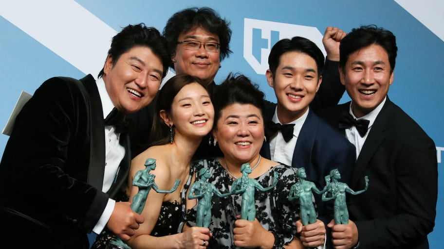 The "Parasite" cast poses at the 26th Annual Screen Actors Guild Awards in 2020, including Director Bong Joon-ho (back) and recently deceased Lee Sun-Kyun (far-right). 