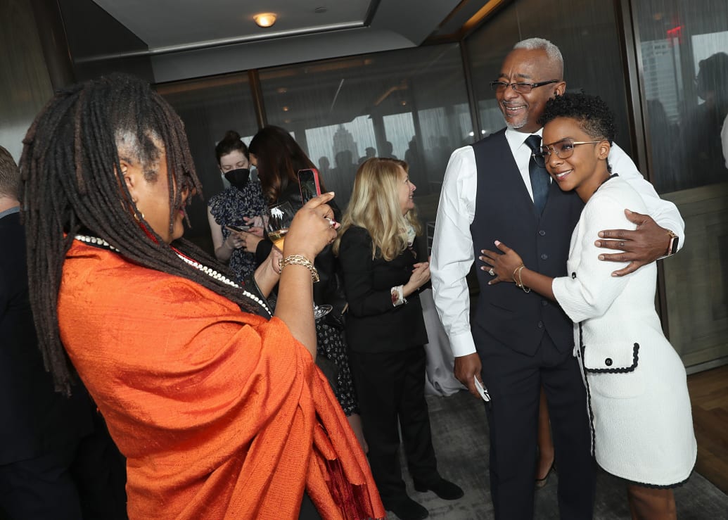 Lynn Nottage and Kara Young, with her father, attend the 75th Annual Tony Awards Nominees' Luncheon at The Rainbow Room on May 24, 2022 in New York City.