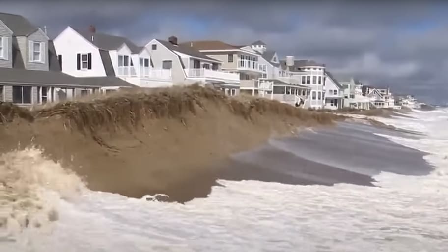 A $500,000 sand dune built to protect beachfront homes in Salisbury, Massachusetts, washed away in just three days. 