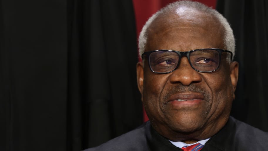 United States Supreme Court Associate Justice Clarence Thomas poses for an official portrait at the East Conference Room of the Supreme Court building.