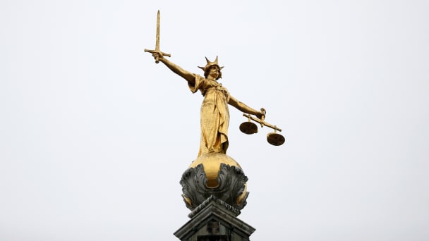 A statue of Lady Justice is seen at Old Bailey central criminal court in London, Britain, Nov. 25, 2019. 