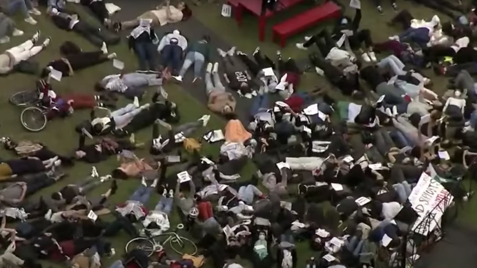 Students take part in a “die-in” at Harvard in a pro-Palestinian protest. 