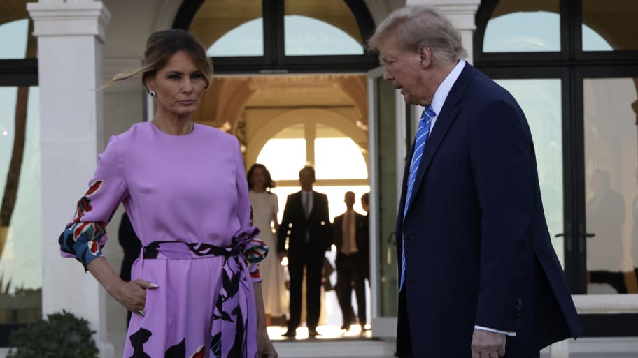 Republican presidential candidate, former US President Donald Trump and former first lady Melania Trump arrive at the home of billionaire investor John Paulson on April 6, 2024 in Palm Beach, Florida
