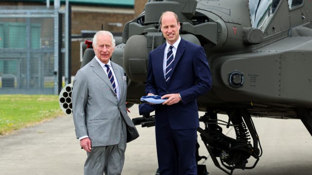 King Charles III and Prince William, Prince of Wales during the official handover in which King Charles III passes the role of Colonel-in-Chief of the Army air corps to Prince William, Prince of Wales
