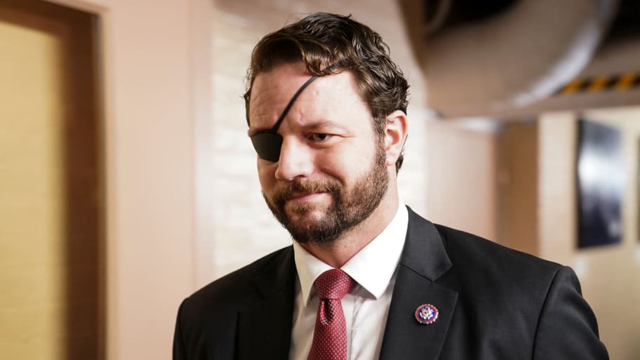 U.S. Rep. Dan Crenshaw (R-TX) walks to a House GOP Caucus meeting at the U.S. Capitol on the first day of the new Congress in Washington, U.S., January 3, 2023.