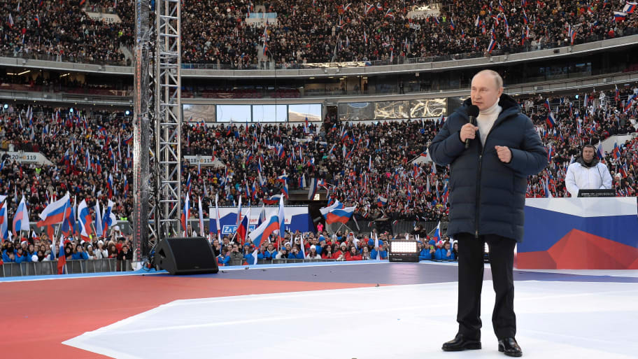 Vladimir Putin delivers a speech during a concert marking the eighth anniversary of Russia’s annexation of Crimea at Luzhniki Stadium in Moscow, Russia, March 18, 2022.