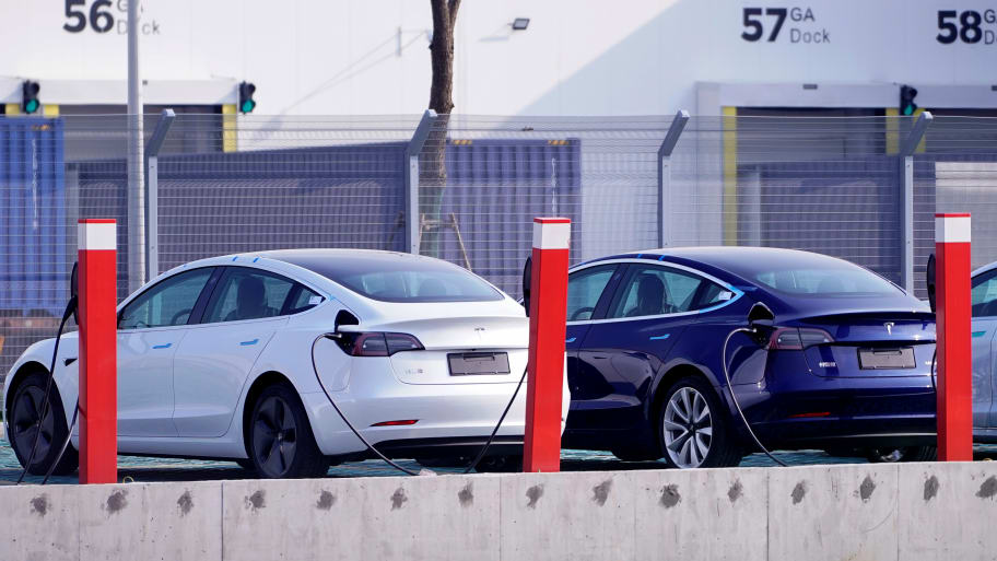 China-made Tesla Model 3 electric vehicles are seen at the Tesla Gigafactory in Shanghai, China, Dec. 2, 2019. 