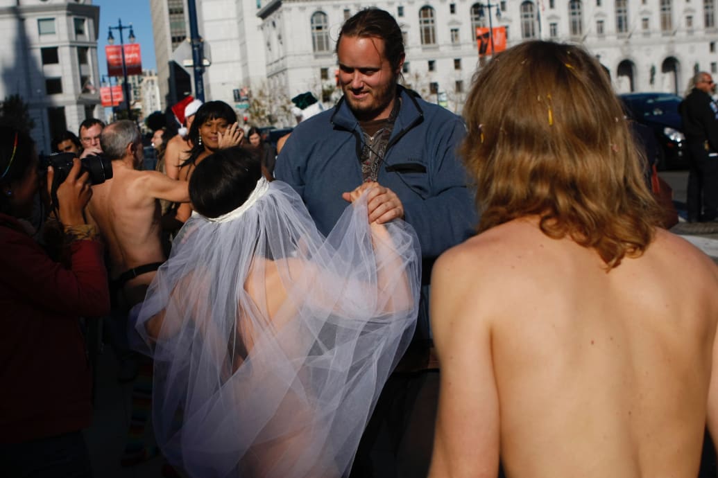 David DePape, center, pictured at the wedding of nudist activist Gypsy Taub in 2013. 