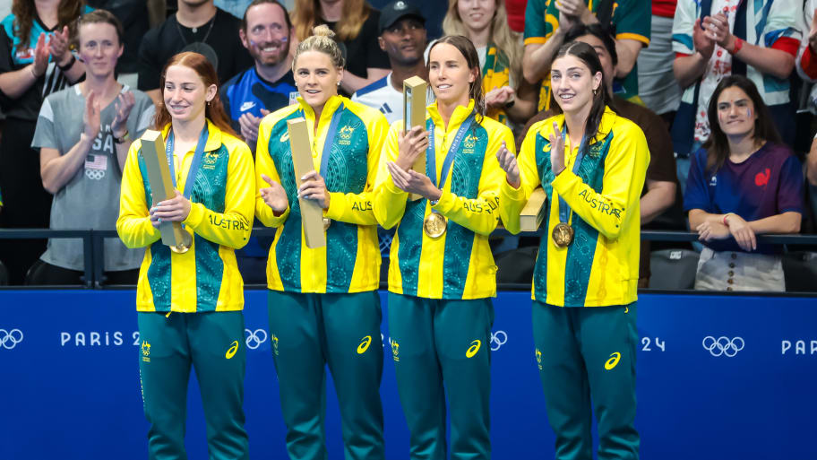 Team Australia's Women's swimming team after winning gold. 