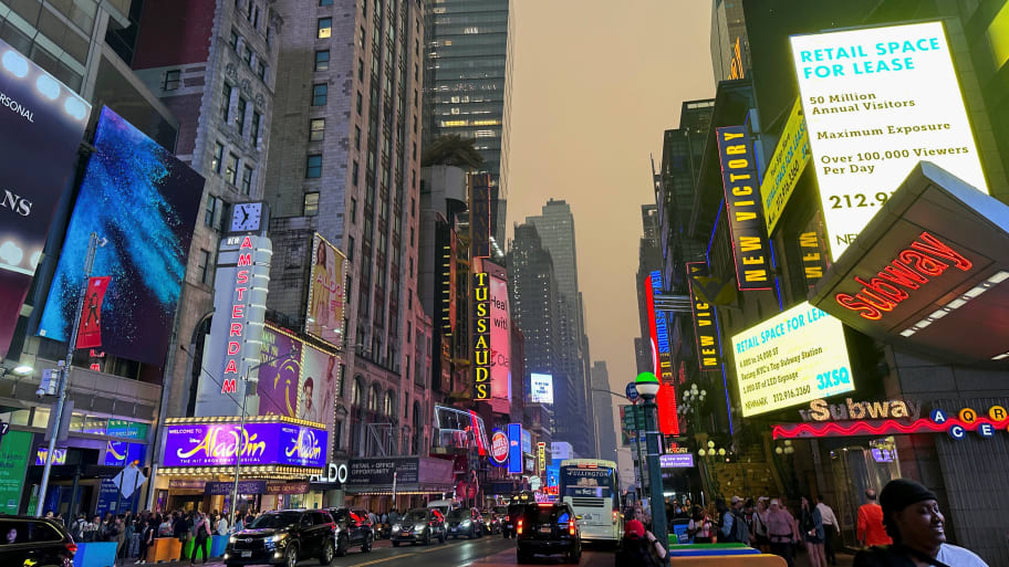 Times Square in Manhattan is shrouded in haze and smoke which drifted south from wildfires in Canada, in New York City, New York, U.S., June 6, 2023. 