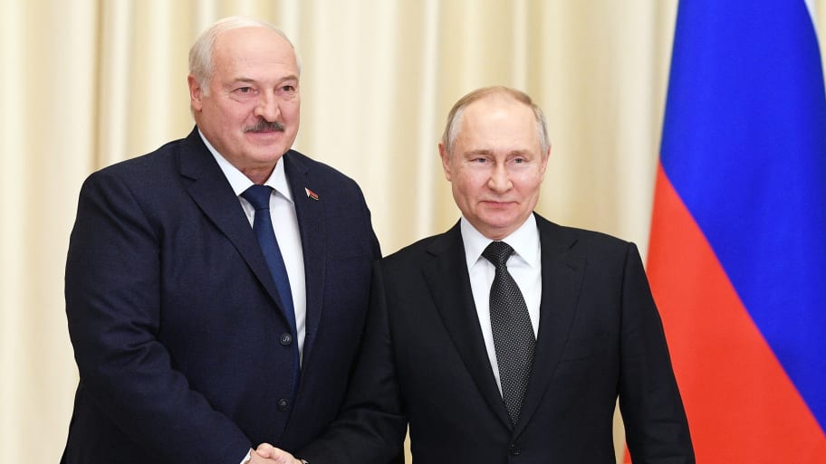 Vladimir Putin shakes hands with Belarusian President Alexander Lukashenko during a meeting at the Novo-Ogaryovo state residence outside Moscow, Russia February 17, 2023. 