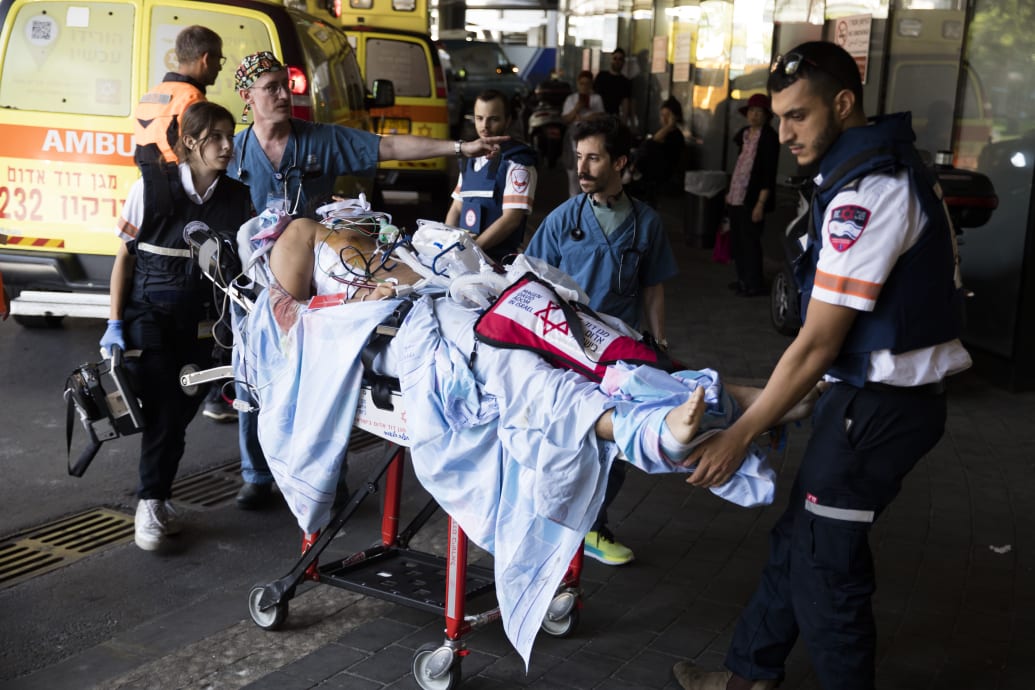 An injured soldier is brought into the Surasky Medical Center in Tel Aviv.