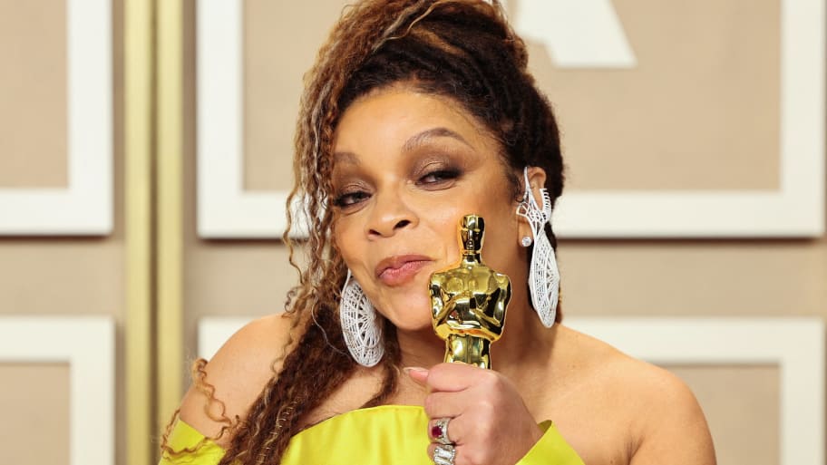Ruth Carter poses with the Oscar for Best Costume Design.