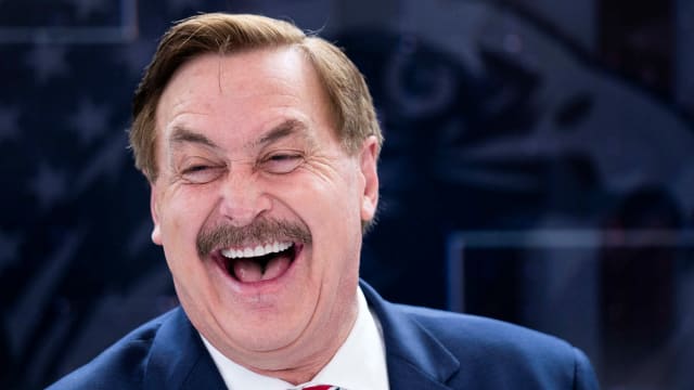 MyPillow CEO Mike Lindell reacts during a radio show hosted by Steve Bannon.