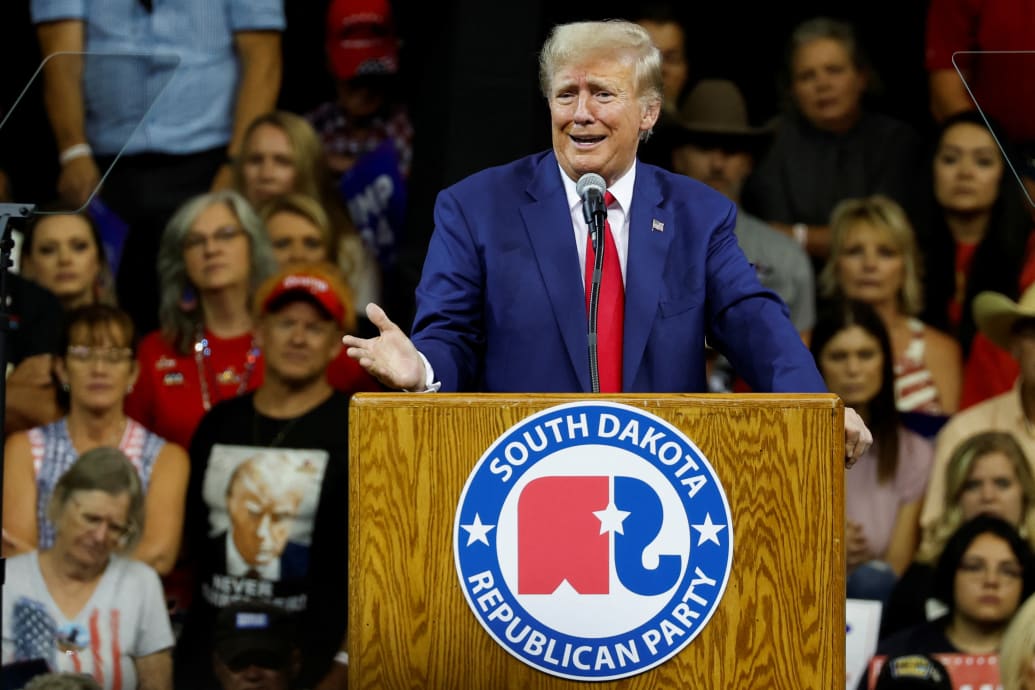 Former U.S. President and Republican presidential candidate Donald Trump speaks at a South Dakota Republican party rally in Rapid City, South Dakota