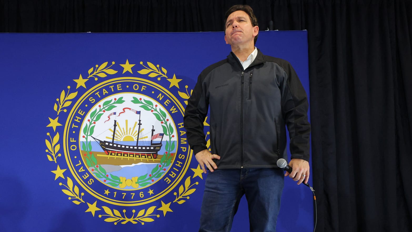 Republican presidential candidate Florida Governor Ron DeSantis listens to a question from the audience at a Never Back Down campaign town hall in Windham, New Hampshire