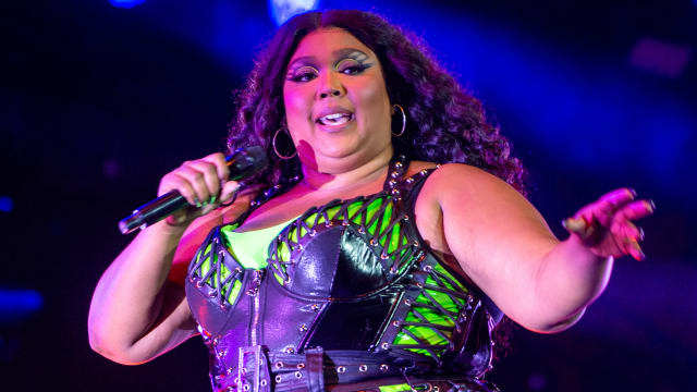 A picture of Lizzo, who has been accused by three of her former dancers of fostering a hostile work environment—as well as allegedly sexually harassing and fat shaming them—in a lawsuit filed Tuesday. More people have since come forward with allegations.
