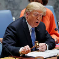 U.S. President Donald Trump bangs a gavel