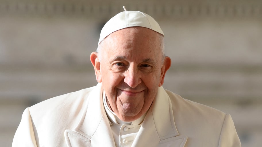 Pope Francis smiles in front of St. Peter’s Square in Vatican City