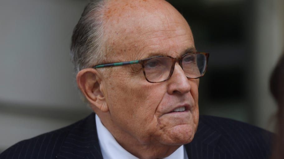 Giuliani exits U.S. District Court after attending a hearing in a defamation suit