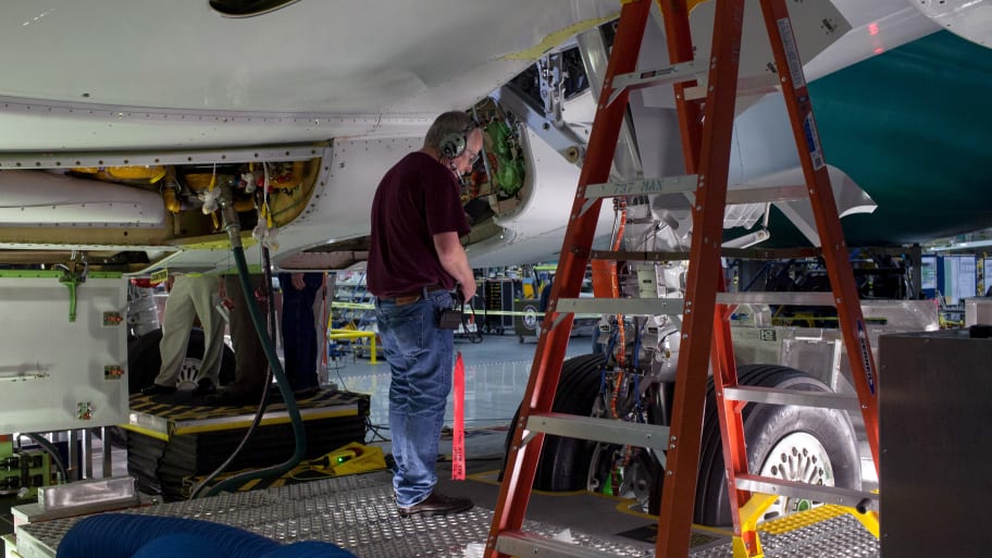 Boeing employee Mike Laeuger is seen working on Boeing 737 MAX