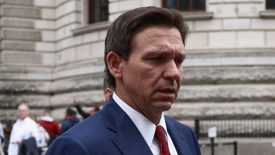 Florida Governor Ron DeSantis walks outside the Treasury during his visit in London, Britain.