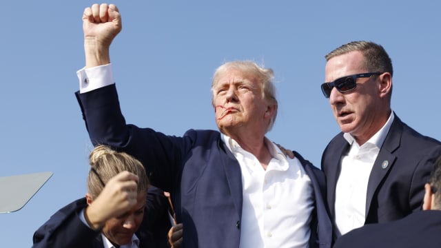 Donald Trump is rushed offstage after being shot during a rally on July 13 in Butler, Pennsylvania.