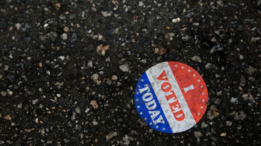 An \"I voted today\" sticker is seen on the ground at Philadelphia's City Hall, an early voting location for the upcoming presidential election, in Philadelphia, Pennsylvania.