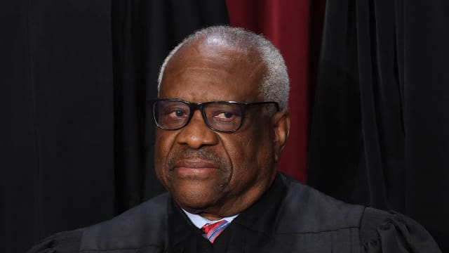 Associate US Supreme Court Justice Clarence Thomas poses for the official photo at the Supreme Court in Washington, DC on October 7, 2022. 
