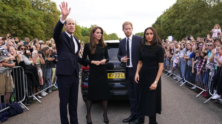 Catherine, Princess of Wales, Prince William, Prince of Wales, Prince Harry, Duke of Sussex, and Meghan, Duchess of Sussex meet members of the public on the long Walk at Windsor Castle on September 10, 2022 in Windsor, England.