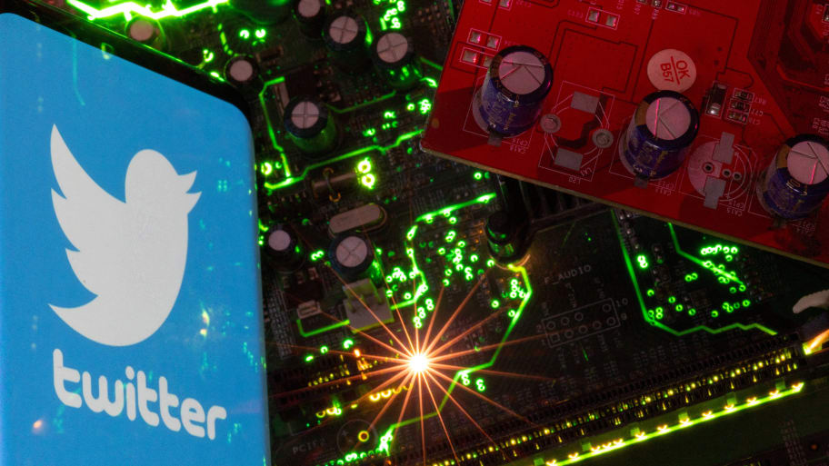 The Twitter logo on a control board of a computer