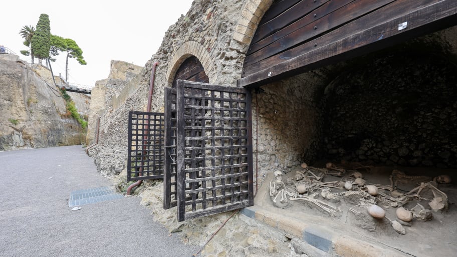 A view of  the skeletons of the fugitive victims of the eruption of Vesuvius in 79 AD on the ancient beach, open to the public for the first time, in the archaeological excavations of Herculaneum. 