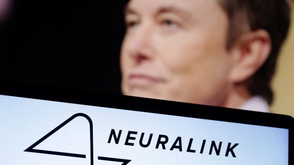 Neuralink logo and Elon Musk photo are seen in this illustration taken Dec. 19, 2022.